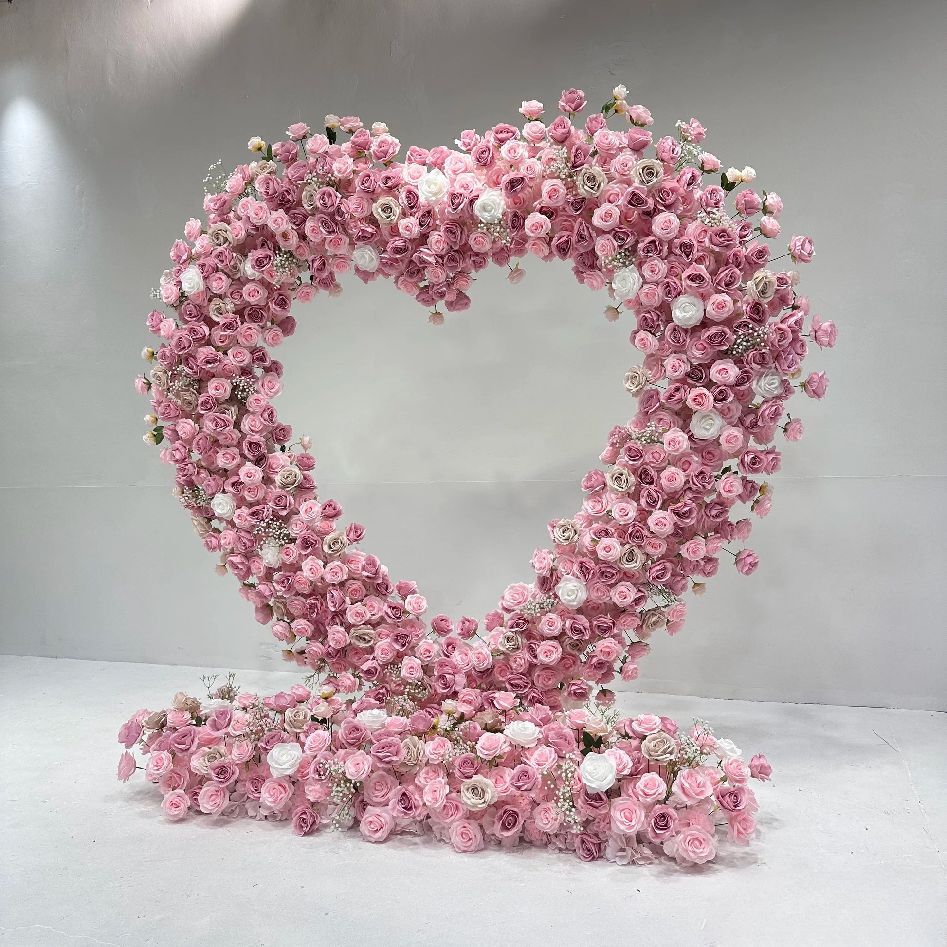 Pink heart - shaped flower arch for wedding banquet event backdrop