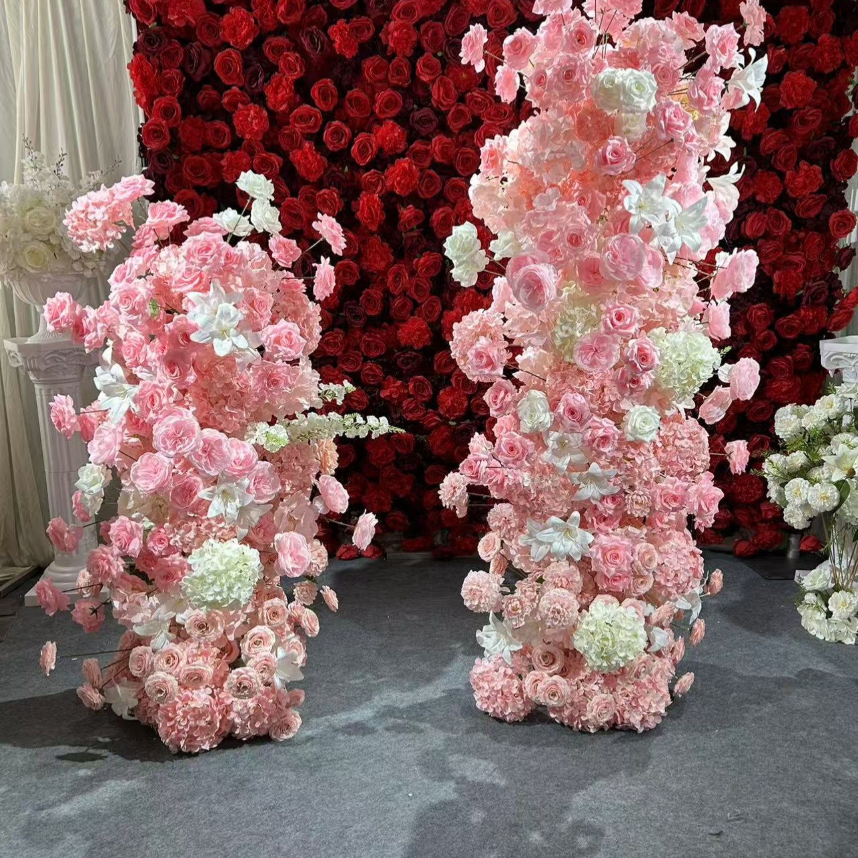 Pink wedding party cow - horn - shaped flower arch