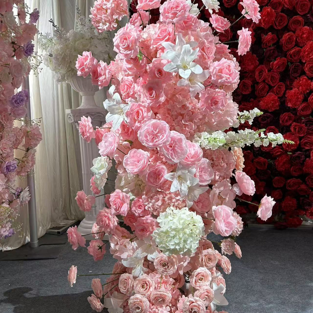 Pink wedding party cow - horn - shaped flower arch